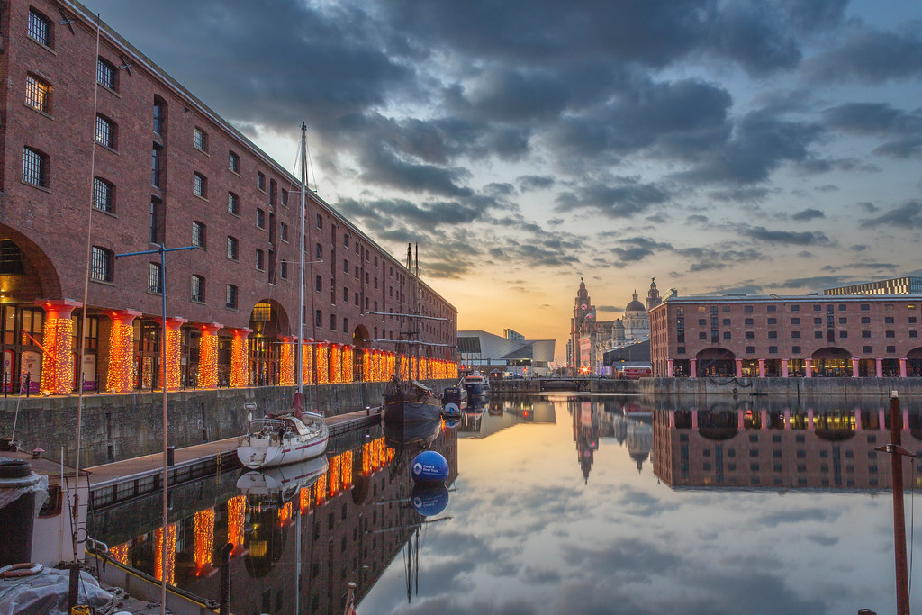 Liverpool Albert Dock at sunset showing the iconic waterfront and historic dock buildings